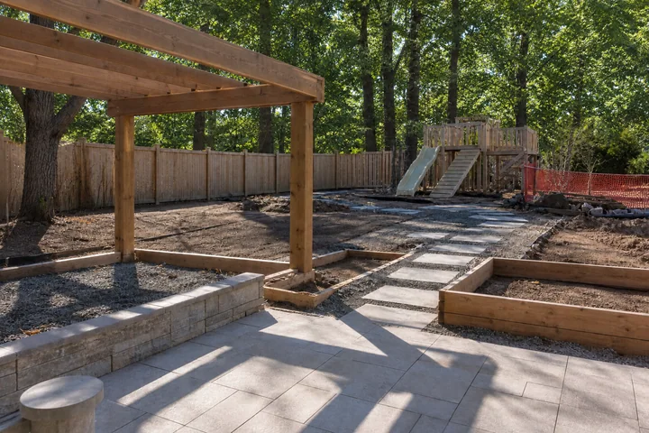 Shaded family backyard: Structures and surfaces